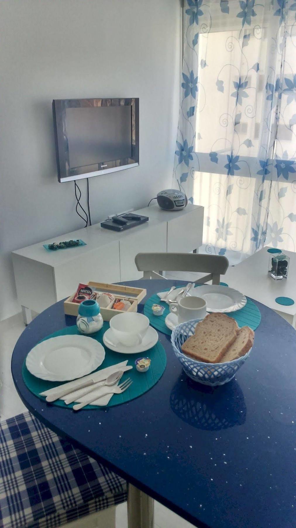 Blue Sky Apartment بينايدورم المظهر الخارجي الصورة
